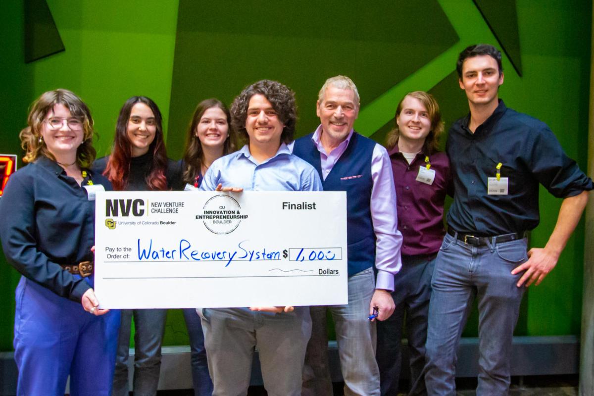 Students winning cash prize by competiting in New Venture Challenge Climate Night 2023