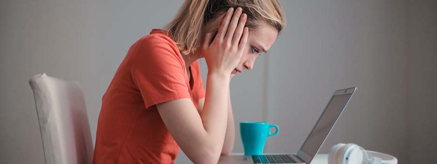 person looking a laptop