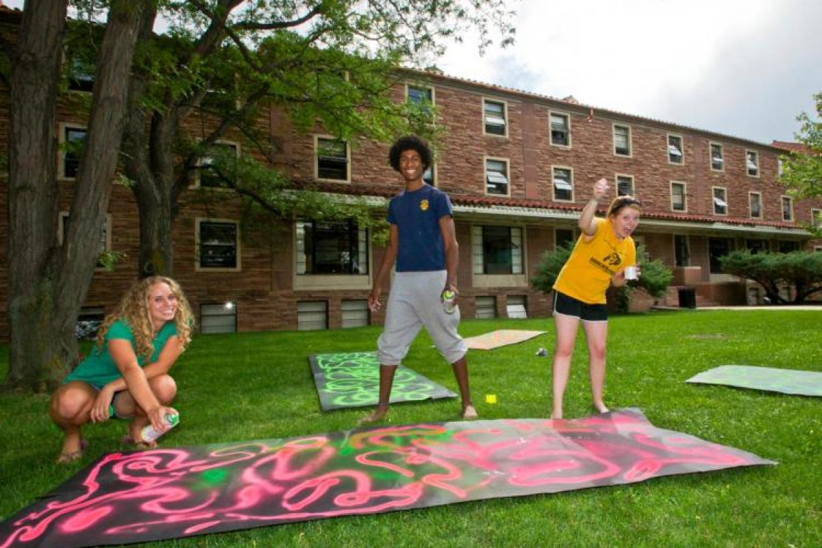students creating a poster